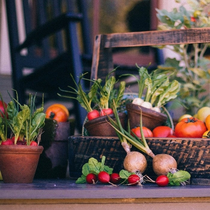 Brown baskets of all sizes filled with colorful fresh vegetable